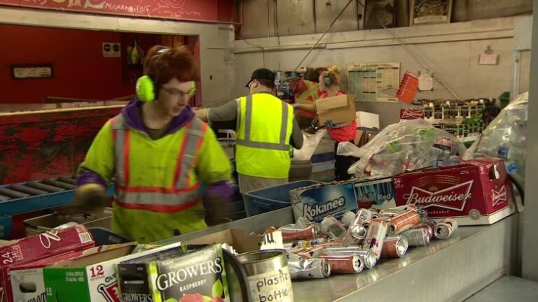 Workers at Raven Recycling, a non-profit that provides recycling services to Whitehorse. More than any other jurisdiction in the North, the Yukon Government is happy to outsource public services to non-profits. (Philippe Morin/CBC)